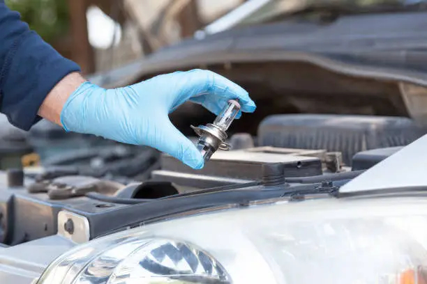 how to replace headlight bulb on your vehicle