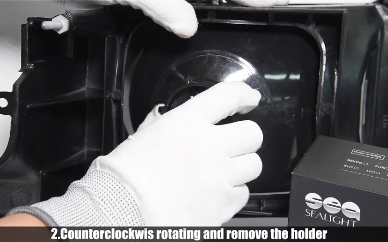 remove the 9004 bulb holder