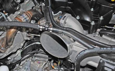 remove the two hose clamps from the small coolant t connector