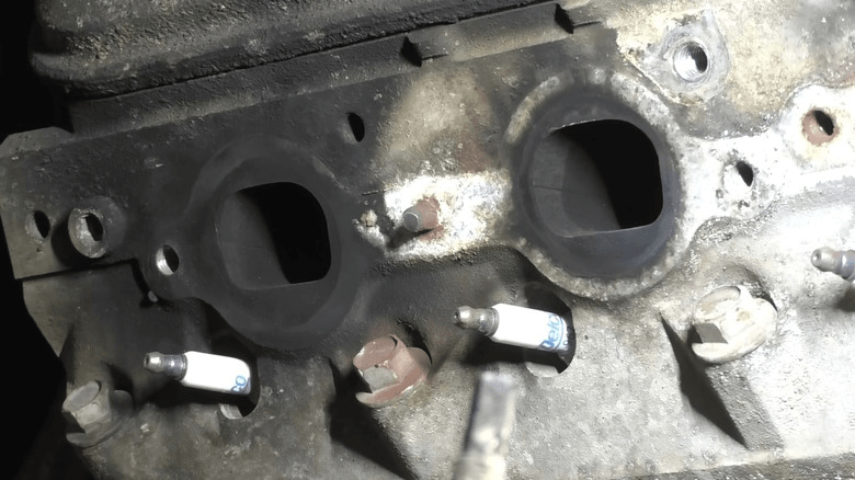 broken exhaust manifold studs on cylinder head