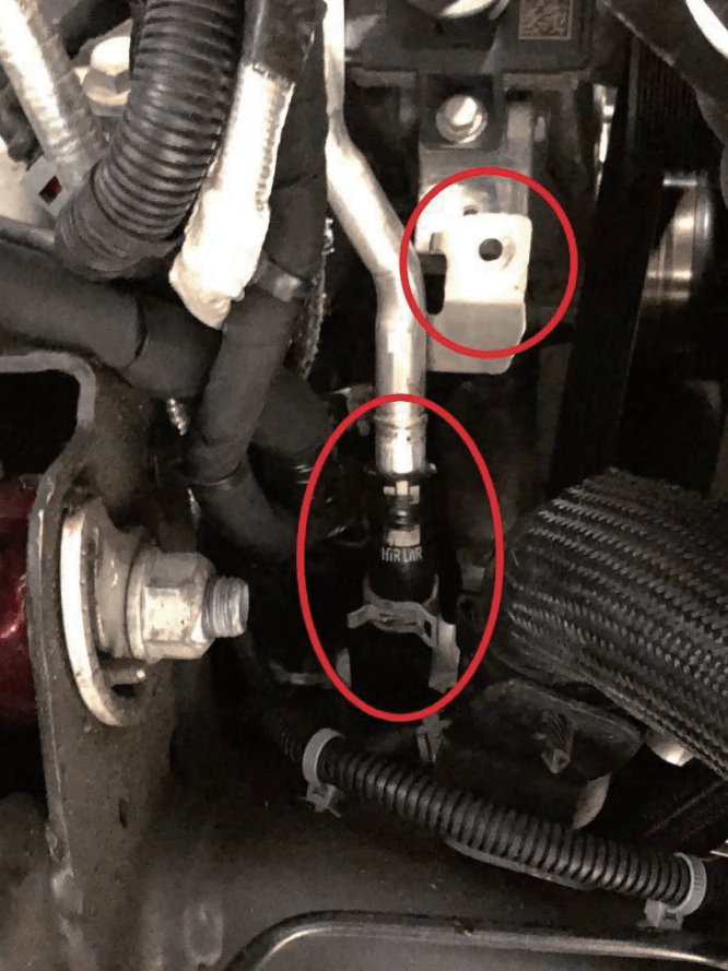 Passenger-side coolant tube lower connection