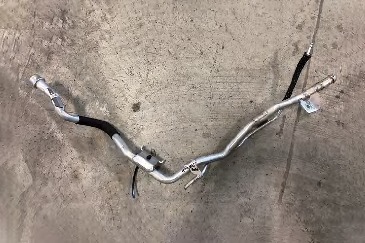 Removed passenger-side coolant tube assembly