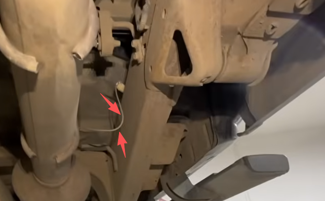 Rear exhaust hoses and connections must be removed before exhaust removal.