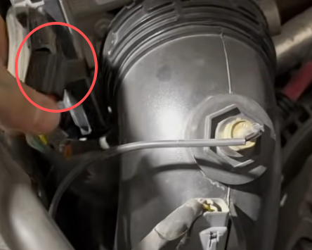 Throttle valve electrical connector location on the LML Duramax intake system.