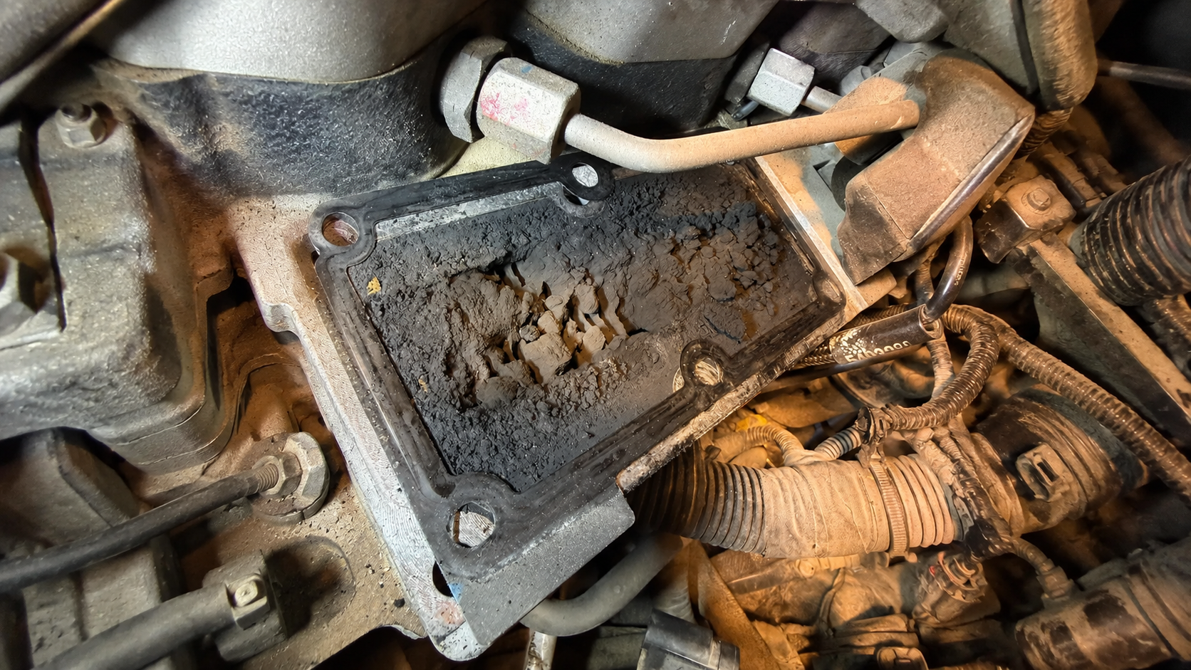 Heavy carbon buildup around a 6.7 Cummins grid heater