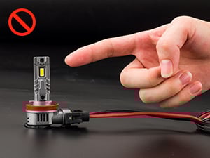 DO NOT TOUCH THE HEATING BULBS